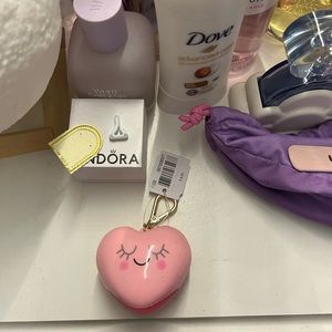Bath and body heart hand sanitizer holder